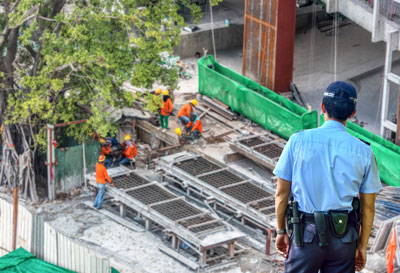 Security guard overlooking a construction site